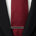 Pinza de corbata con incrustaciones de ónix